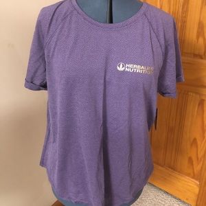 Purple workout shirt. New. Herbalife logo. XL